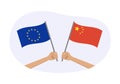 EU and China flags. Chinese and European Union symbols. Hand holding waving flag. Vector illustration Royalty Free Stock Photo
